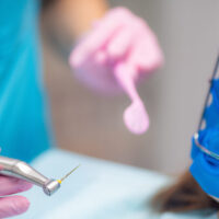 Root Canal Treatment. An Endodontist Preparing Patient for Root Canal Treatment.